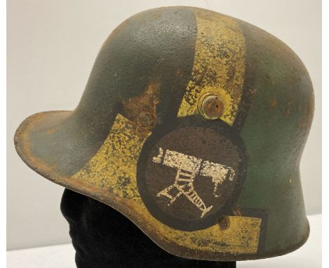 WWI style Imperial German M16 machine gunners Stahlhelm helmet with painted camouflage detail.  