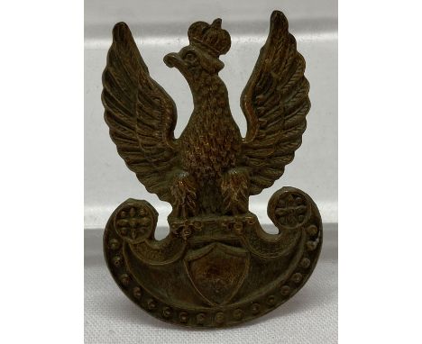 A WWII style Polish army (in exile) cap badge.  Approx. 4cm long.