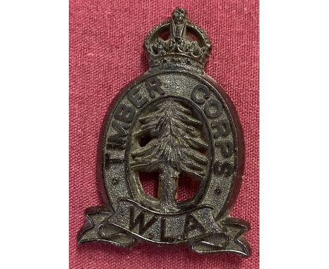 A WWII style Woman's Land Army Timber Corps (Lumber Jills) plastic economy cap badge.  