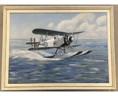 A framed oil on canvas of a vintage Royal Airforce Seaplane. Signed to bottom right Noel A Bray.  Frame size approx. 46.5 x 6