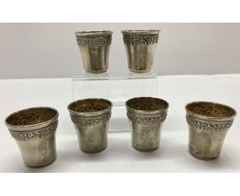 A set of 6 German WWII style silver plated Waffen SS Schnapps cups. Ornate decoration to body of each cup. Each cup approx. 4