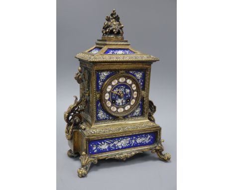 A French brass and porcelain mounted mantel clock, with keys height 34cm