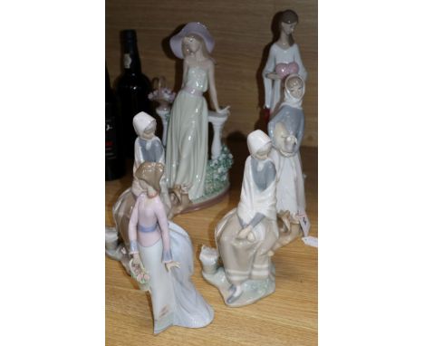 A Lladro girl with a straw hat, girl with a heart, two seated pheasant girls, girl with lamb and girl with basket (6)