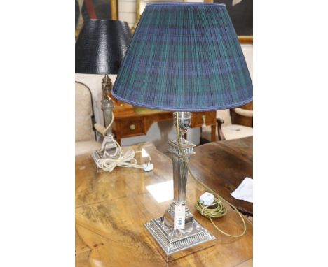 A silver-plated table lamp, with fluted tapered column and urn top and a similar table lamp overall height 72cm