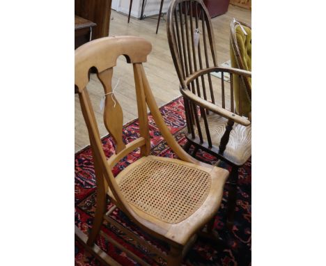 A Victorian ash and elm comb back elbow chair and a rocking chair