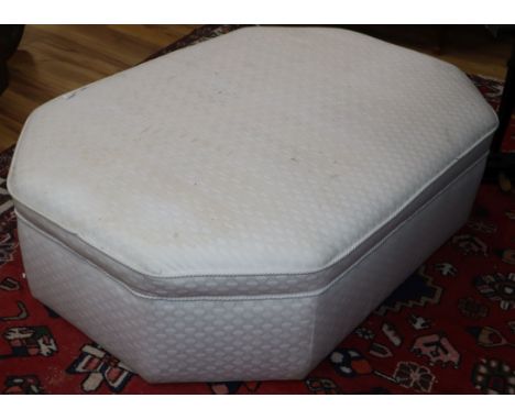 A large octagonal pouffe, upholstered in cream damask L.150cm approx.