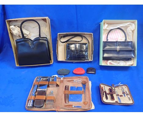 A VINTAGE 'RIVIERA' HANDBAG (BOXED) two other handbags, and two dressing cases