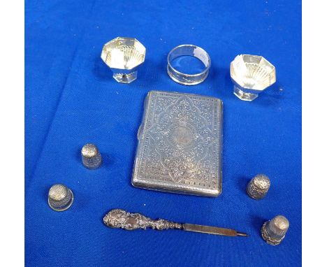 A SILVER CIGARETTE CASE with other small silver items