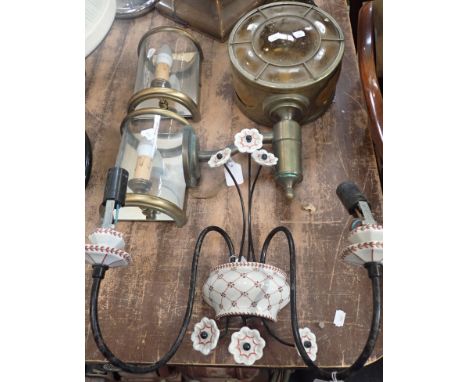 A METAL AND CERAMIC WALL LIGHT with an exterior wall light and two other wall lights