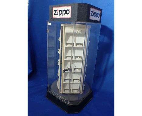 A VINTAGE ZIPPO LIGHTER SHOP DISPLAY CASE (REVOLVING) with key 89cm high (holds 40 lighters)