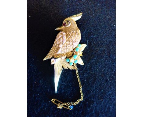 BOUCHER: A VINTAGE BIRD BROOCH with attached safety chain