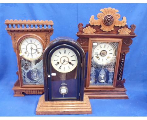 AN AMERICAN WATERBURY 'GINGERBREAD' TYPE SHELF CLOCK another similar, and an arched-top cased American clock (all cases re-fi