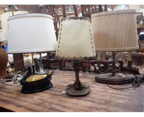 A PAPIER MACHE BLACK AND GOLD DUCK LAMP BASE with two other lamps (3)