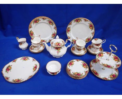 A ROYAL ALBERT 'OLD COUNTRY ROSES' TEA AND DINNER SERVICE for six, with cake stand, teapot etc.
