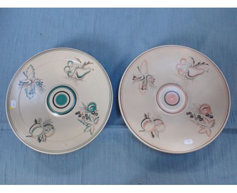 TWO POOLE POTTERY DISHES, PAINTED WITH FRUIT one green, the other pink 32.5cm diam