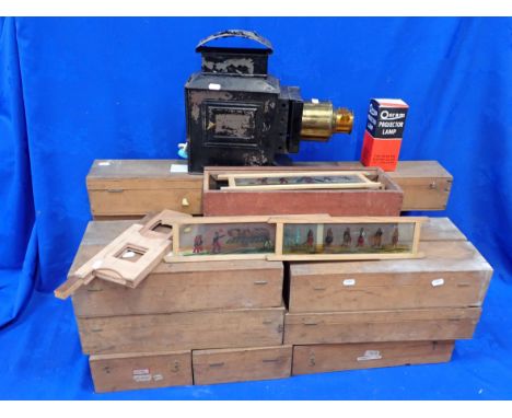 A LARGE QUANTITY OF MAGIC LANTERN SLIDES in wooden cases, mostly world travel mixed series, British views etc, with a basic t