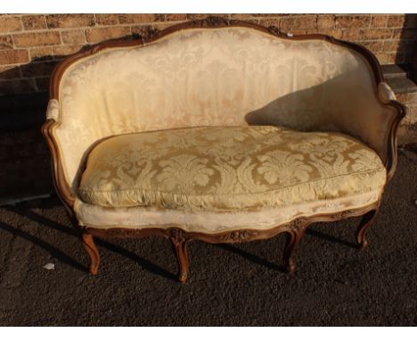 A LOUIS XV STYLE SOFA with carved beech frame, in yellow damask 132cm wide