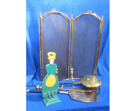 AN 'AGA' PIZZA/BAKER'S PEEL, A GEORGIAN CHESTNUT ROASTER with iron handle, a set of brass fire tools and screen and a wooden 