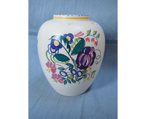 A POOLE POTTERY VASE, SIGNED S. RUSSELL painted with flowers 21.5cm high