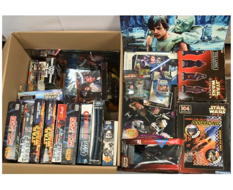 Quantity of Star Wars Board Games, Puzzles and other interactive games. Lot includes Star Wars Saga Edition Monopoly, x two S