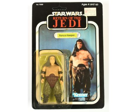 Kenner Star Wars vintage Return of the Jedi Rancor Keeper 3 3/4" figure, Near Mint, within Good (dented and yellow) bubble, u