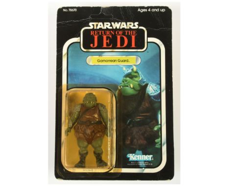 Kenner Star Wars vintage Return of the Jedi Gamorrean Guard 3 3/4" figure, Mint, within Good Plus (yellowed) bubble, upon Goo