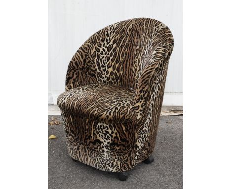 Peter Stringfellow Interest - a 20th Century tub chair, upholstered in leopard print velvet, on castors, approx 86cm highThis