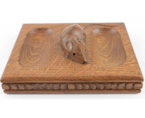 WORKSHOP OF ROBERT 'MOUSEMAN' THOMPSON; a carved oak desk tidy with signature carved mouse to the centre and oval dish cut-ou