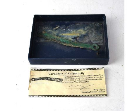 An item of ancient Chinese knife money, with certificate of authenticity dating it between 400-255BC, used in the Northern Ch