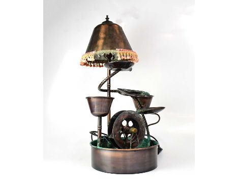 A contemporary copper indoor combination water wheel and lamp, overall height 70cm.Condition Report: - Obvious signs of verdi