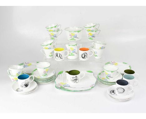 SUSIE COOPER; a black fruit coffee set comprising six coffee cans and saucers and a cream jug, also a Heathcote China 'The Le