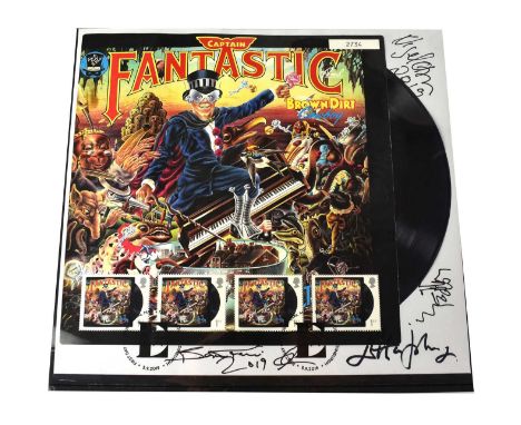 ELTON JOHN; a first day cover for 'Captain Fantastic and the Brown Dirt Cowboy', bearing the signatures of Elton John and Ber