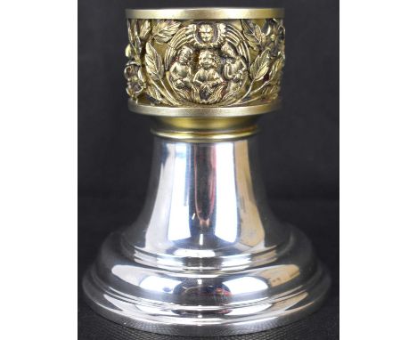 An Elizabeth II hallmarked silver candle lamp base, made by order of the Dean and Chapter of York to commemorate the restorat
