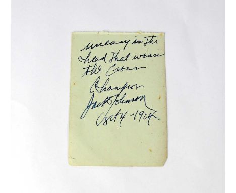 JACK JOHNSON; a torn page from an autograph album bearing the world heavyweight champion's signature and dedication, 'Heavy i
