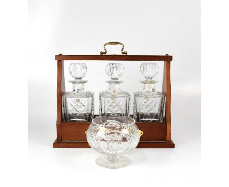 EVERTON FOOTBALL CLUB; a modern wooden tantalus containing three cut glass decanters, with presentation plaque for Everton Fo