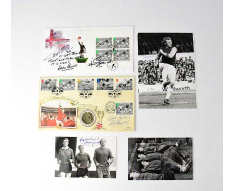 WORLD CUP 1966; three black and white photographs signed Bobby Moore, a first day cover signed by Martin Peters, Geoff Hurst,