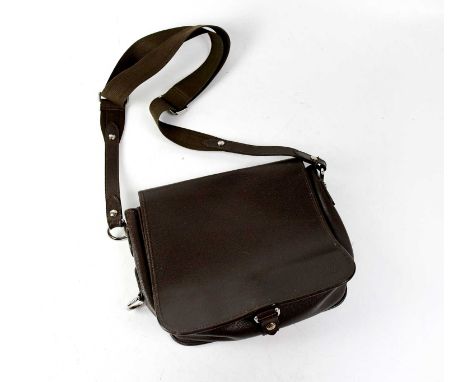 LOUIS VUITTON; a brown leather messenger bag with fold-over front and button fastening, with an adjustable canvas shoulder st