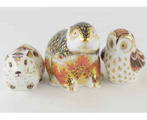 ROYAL CROWN DERBY; three porcelain animal paperweights decorated in the Imari palette, comprising 'Riverbank Beaver', limited