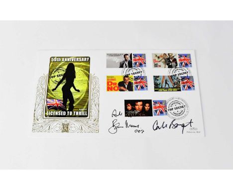 JAMES BOND 007; a first day cover for the 50th anniversary of James Bond, signed by Roger Moore and Carol Bouquet (Melina 'Fo