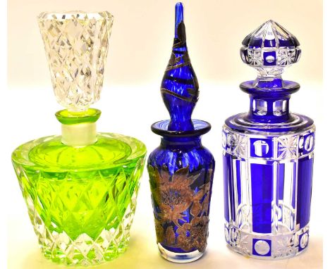 Three art glass perfume decanters, one with green and clear body, height 17cm, one with blue and clear body with vertical str