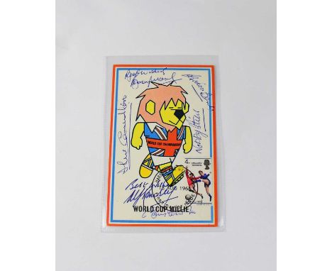 WORLD CUP 1966; a World Cup Willie postcard bearing the signatures of Bobby Moore, Nobby Stiles, Gordon Banks, Alf Ramsay, Bo