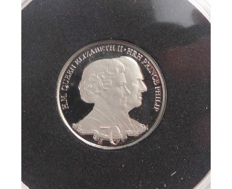 THE LONDON MINT; 'The Platinum Wedding Anniversary Double Portrait Coin', £10, platinum, 999.5/1000, approx. 3.12g, diameter 