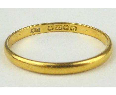 A 22ct gold thin band ring, size R, approx. 1.95g.