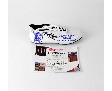 GEOFF HURST; a branded England and Geoff Hurst single football boot, signed by the World Cup hat trick player, with certifica