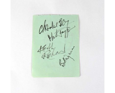 THE ROLLING STONES; a torn page from an autograph album bearing the signatures of Mick Jagger, Bill Wyman, Charlie 'Boy' Watt