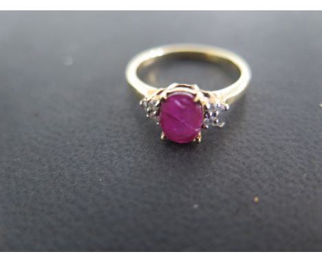 A 9ct gold ruby and diamond ring size N - weight approx 2.5 grams - good condition