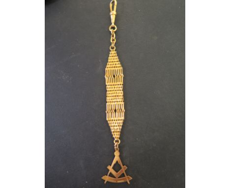 A 9ct yellow gold Masonic pendant on a rolled gold link chain and clasp - length 15cm - no obvious damage