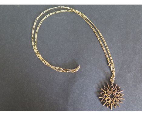 A 9ct yellow gold pendant and chain, chain approx 64cm long - total weight approx 13 grams - in good condition