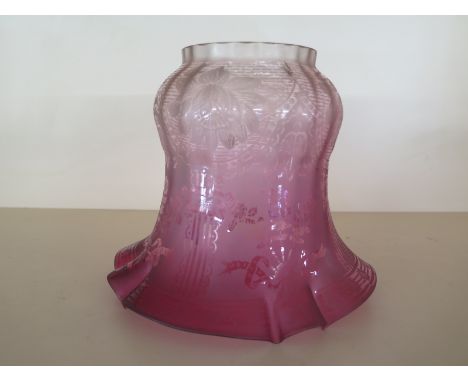 A Victorian cranberry etched glass oil lamp shade - in good condition, no chips or cracks but has a slight factory flaw to to