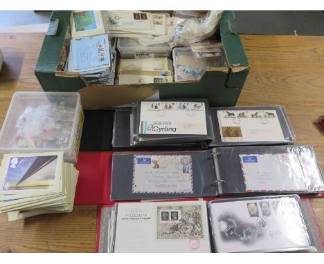 A selection of First Day covers and loose stamps